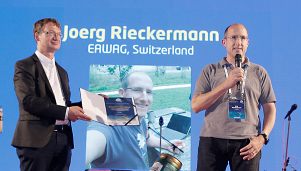 Jörg Rieckermann awarded with “Mid-term Career Achievement Award” (Photo: ICUD 2017)