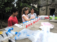 Scientists preserving water samples near Hanoi (© Eawag) 