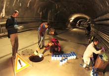 Collecting samples in a sewer channel near Glattstollen (ZH). 