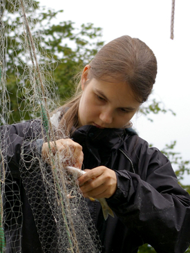 Biologist Carmela Dönz conducting fieldwork as part of “Projet Lac”